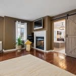 15 Belsey Lane Newcastle Home For Sale Primary Bedroom Gas Fireplace