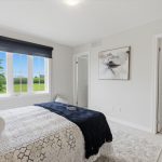 Primary bedroom with walk in closet