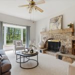 Living room with wood burning fireplace