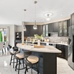 Kitchen with island and extended breakfast bar