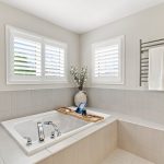Soaker tub in primary ensuite