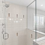 Glass shower in primary bathroom