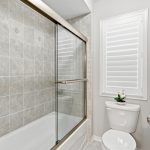 Shower and tub in bathroom